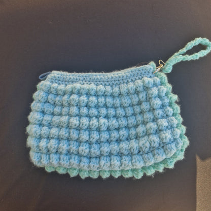 נרתיק מנטה סרוג בעבודת יד בצבע ירוק בהיר