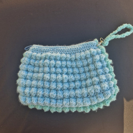 נרתיק מנטה סרוג בעבודת יד בצבע ירוק בהיר