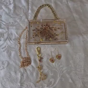 תיק אקרילי ייחודי בעיצוב פרחוני שקוף Golden Blossom